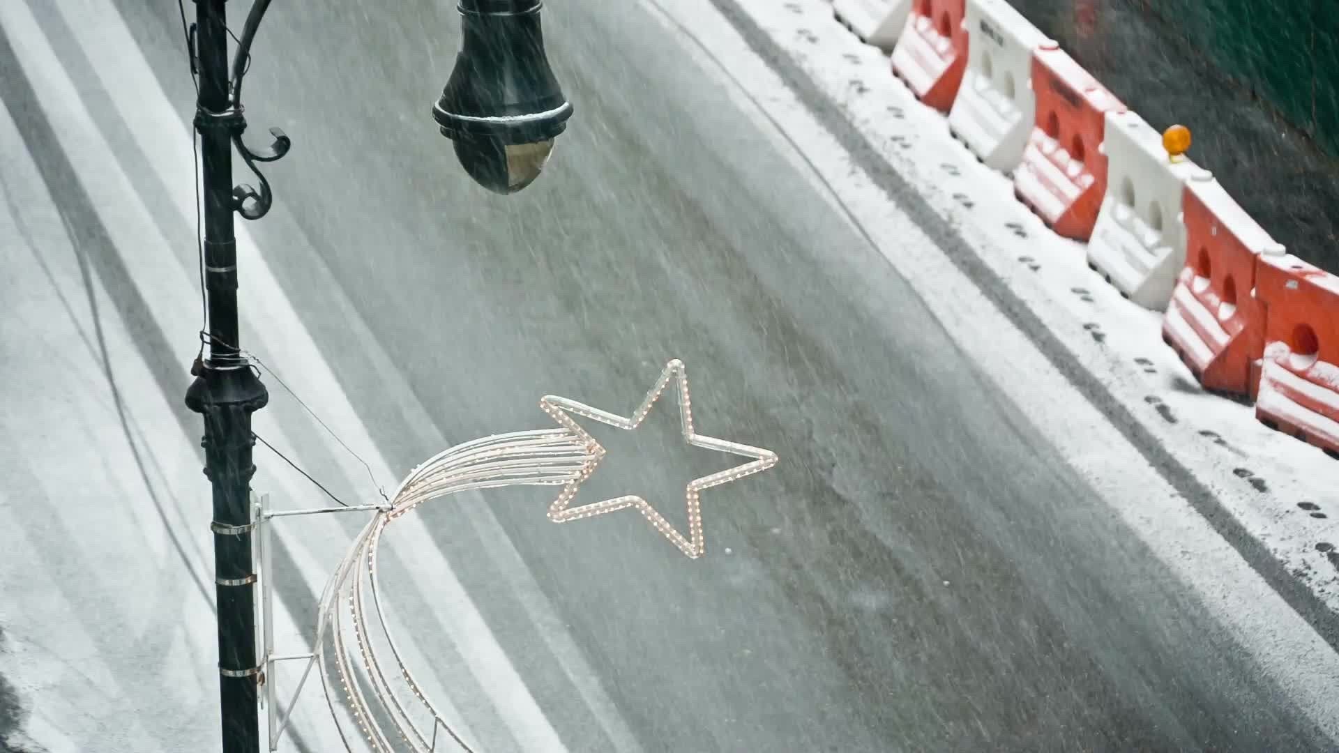 snowing on empty street - holiday season - seamless loop