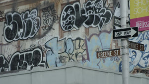 graffiti on SoHo building - summer morning on Greene Street and Prince in Lower Manhattan NYC
