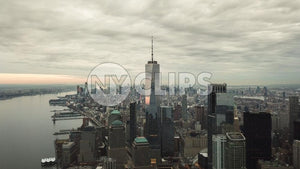 Freedom Tower aerial on cloudy day - Manhattan buildings and skyscrapers in New York City NYC
