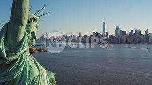 close-up of Statue of Liberty face with Manhattan Island skyline in background in New York City NYC