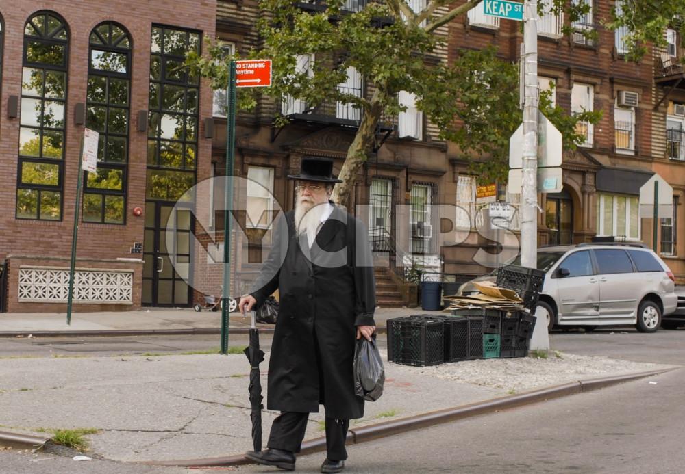 Orthodox Jew taking a walk in Williamsburg Brooklyn New York City