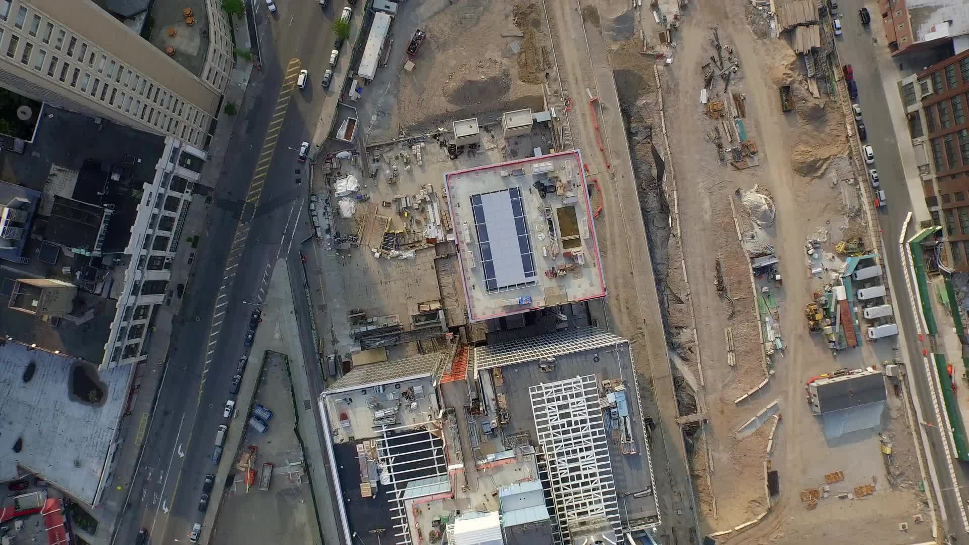 Harlem construction site over Uptown Manhattan 4K NYC