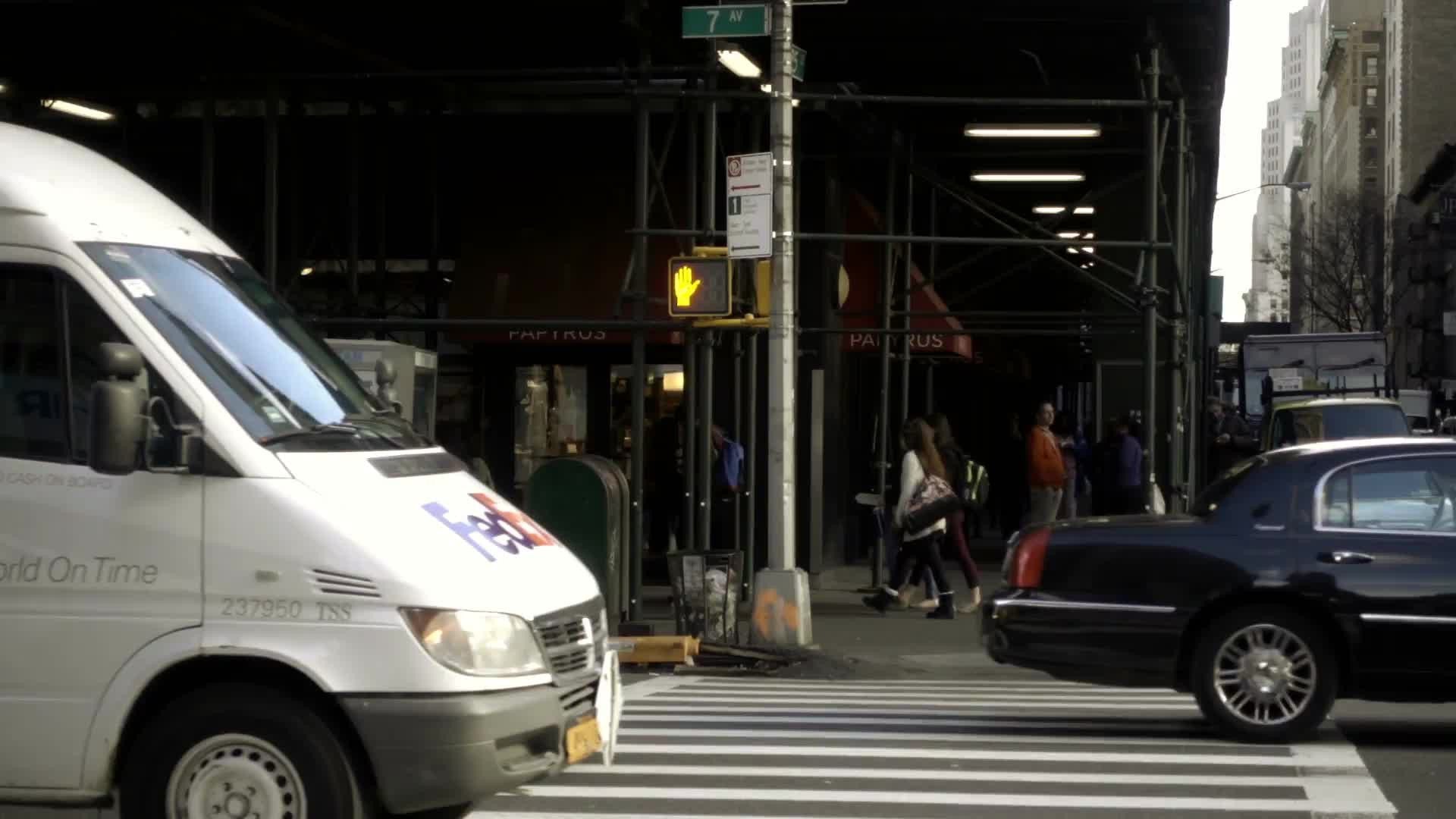 FedEx truck driving in Midtown Manhattan - slow motion traffic in NYC