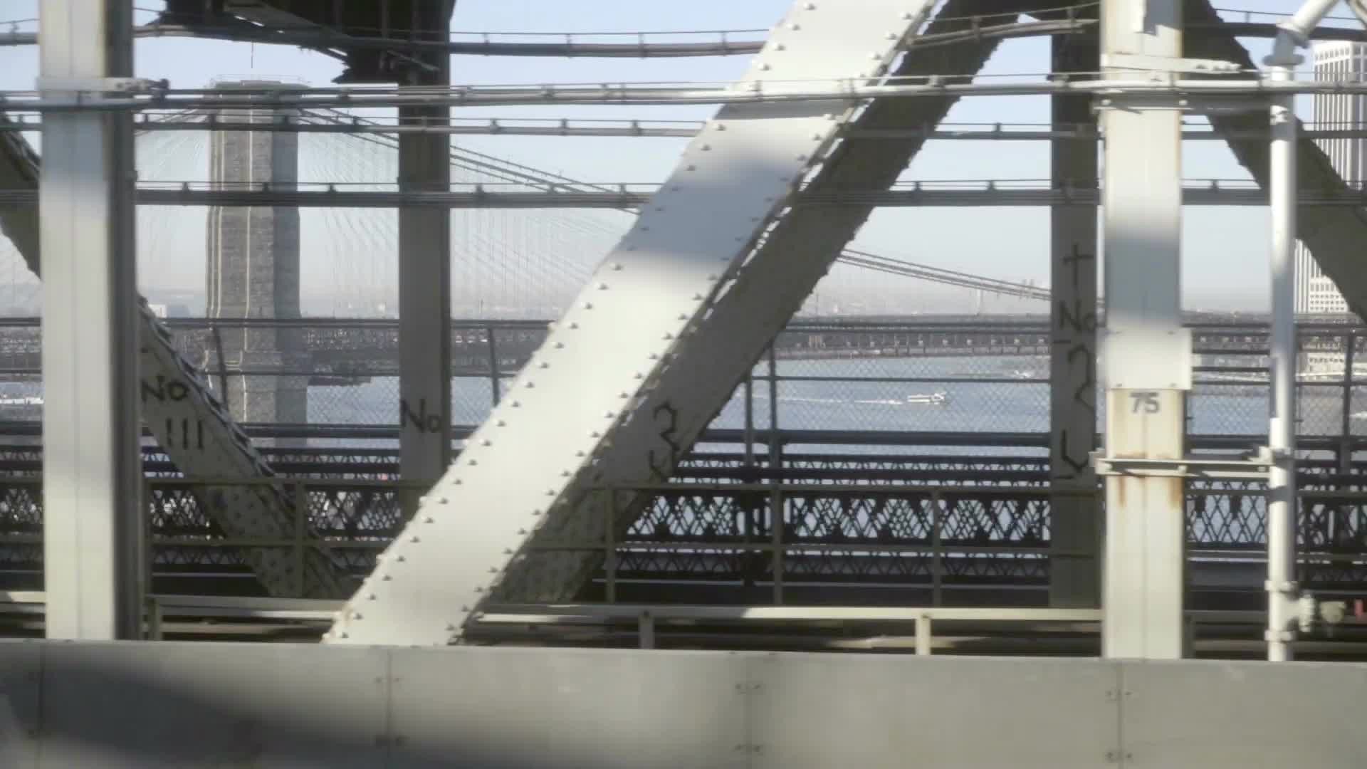 Brooklyn Bridge view from B Train - subway crossing Manhattan Bridge in NYC