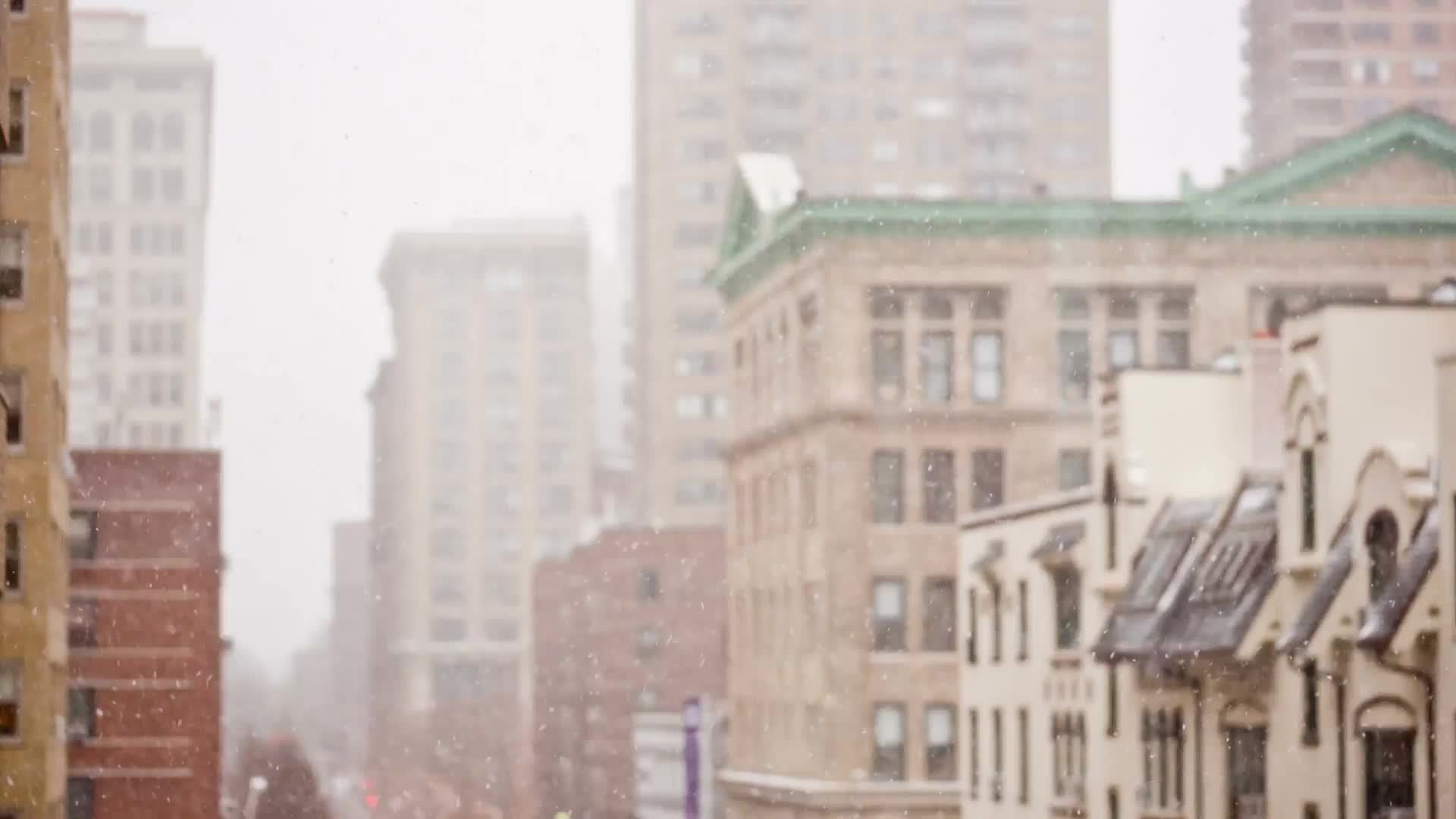 buildings in winter - snowing in Manhattan - New York City