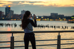 Young woman taking photo