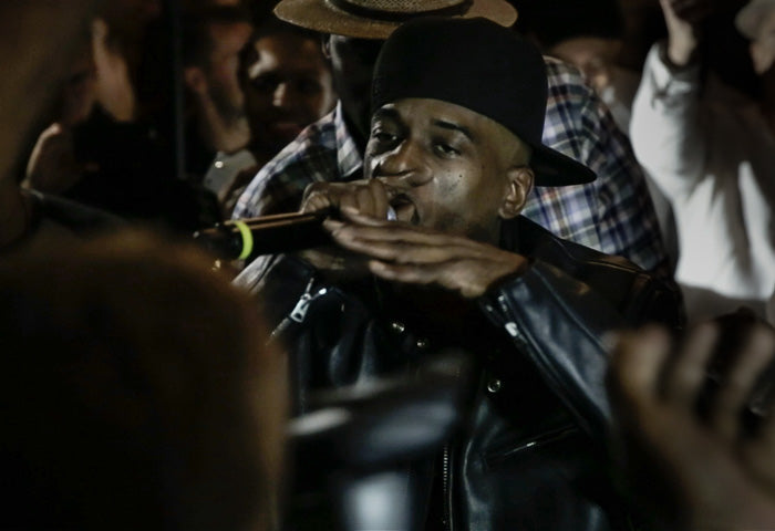 Rakim rapping at live show