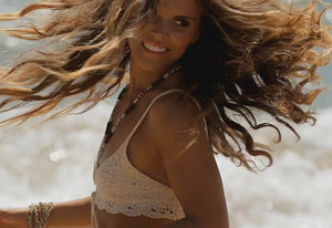 Still of model from Tone It Up promo