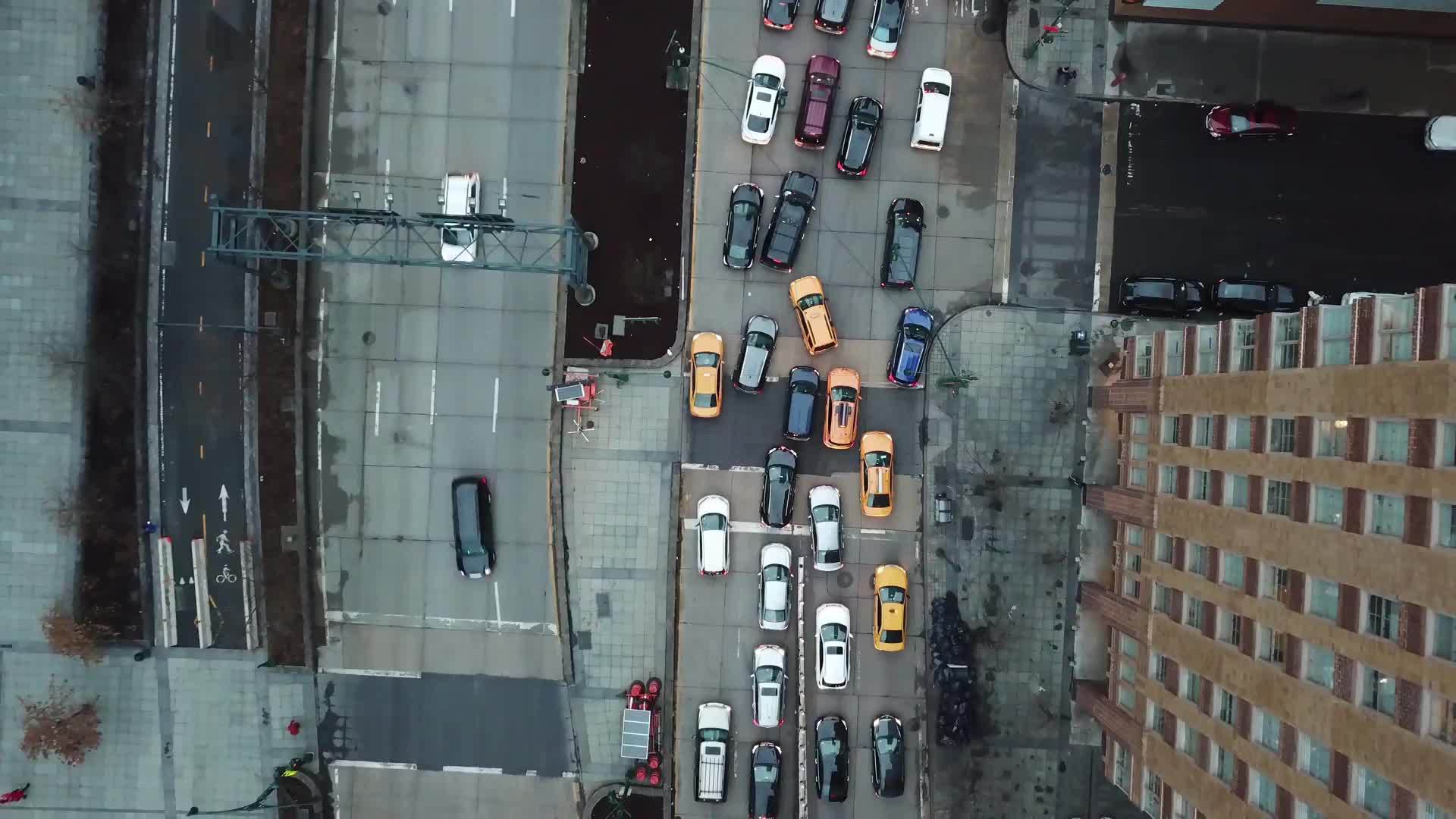 Traffic from above aerial of cars driving in congested lane New York City NYC in 4K and 1080 HD