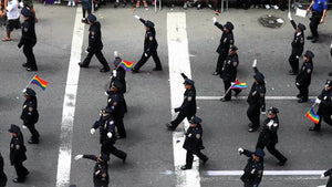 NYPD police officers marching in uniform at Gay Pride Parade in NYC