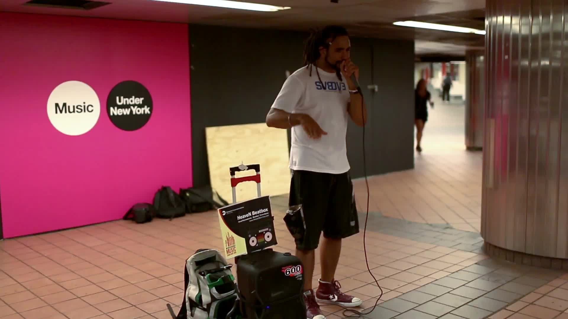 musician beatboxing - beatboxer in subway station in summer - New York City