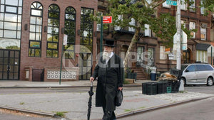 Orthodox Jewish man walking in Williamsburg Brooklyn NYC