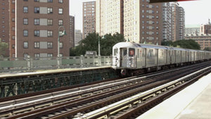 1 Train entering elevated 125th street station in Harlem NYC