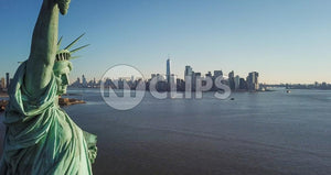 Statue of Liberty closeup with Manhattan skyline in background in New York City NYC