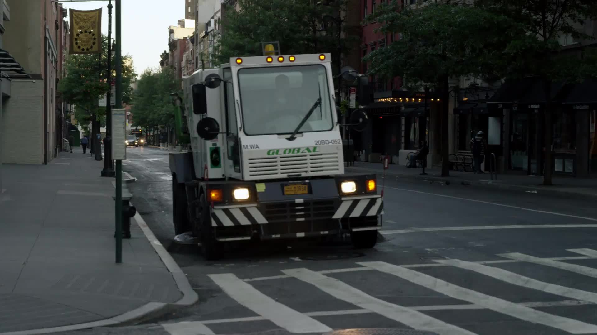 street sweeper crossing 5th Ave on 8th street - cleaner vehicle driving in Manhattan New York City, NYC in 4K and 1080 HD