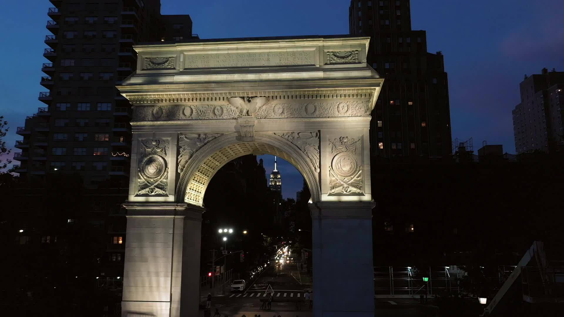 passing through Washington Square Park arch at night Manhattan New York City NYC