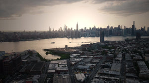 aerial toward Manhattan skyline sunset from Greenpoint Brooklyn New York City NYC