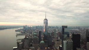 Freedom Tower aerial moving forward toward Manhattan buildings in 4K and 1080 HD