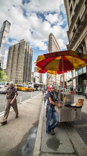 hot dog stand in Flatiron District on 5th Ave - summer day in Manhattan NYC